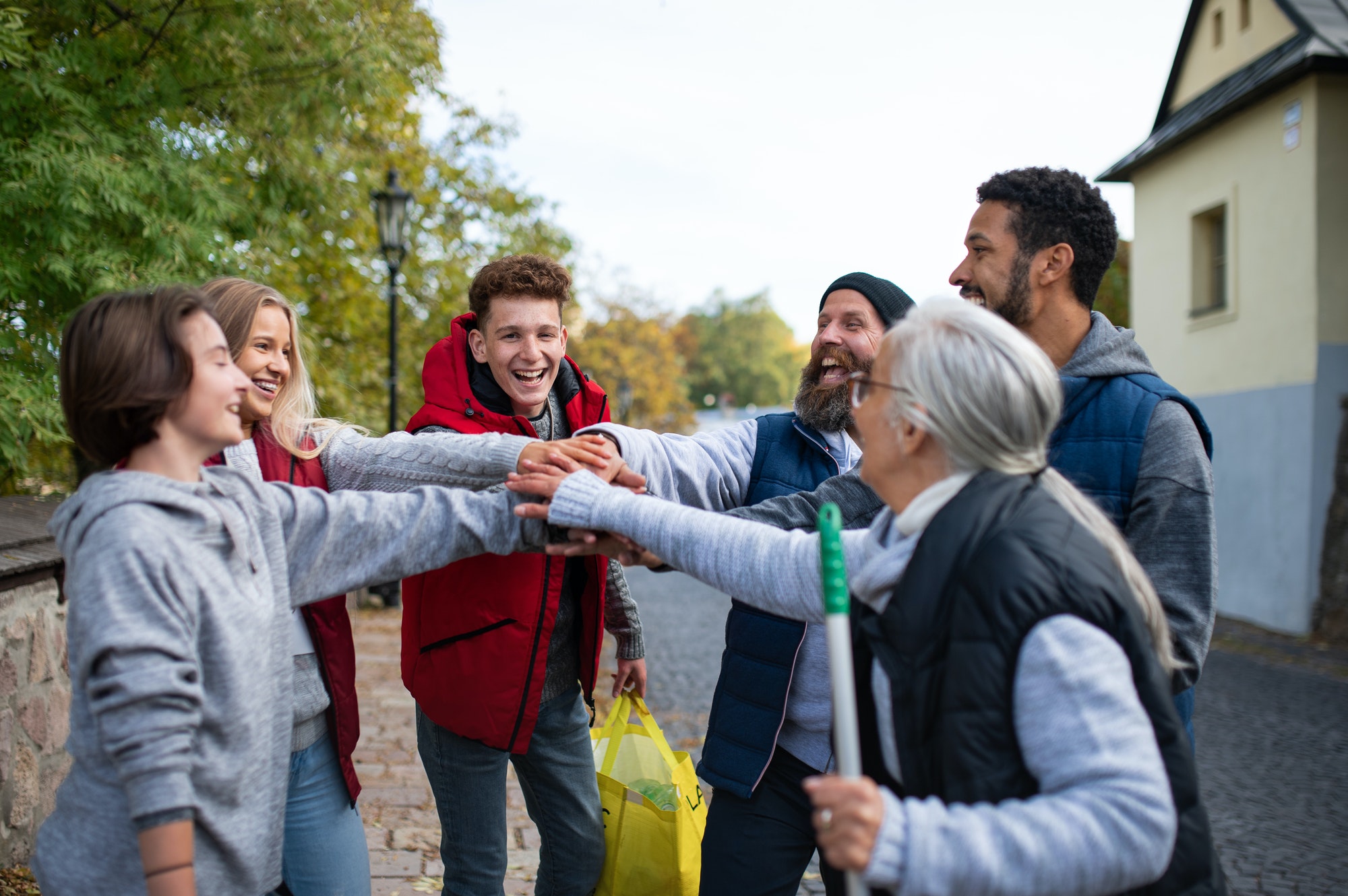 Group of happy community service volunteers